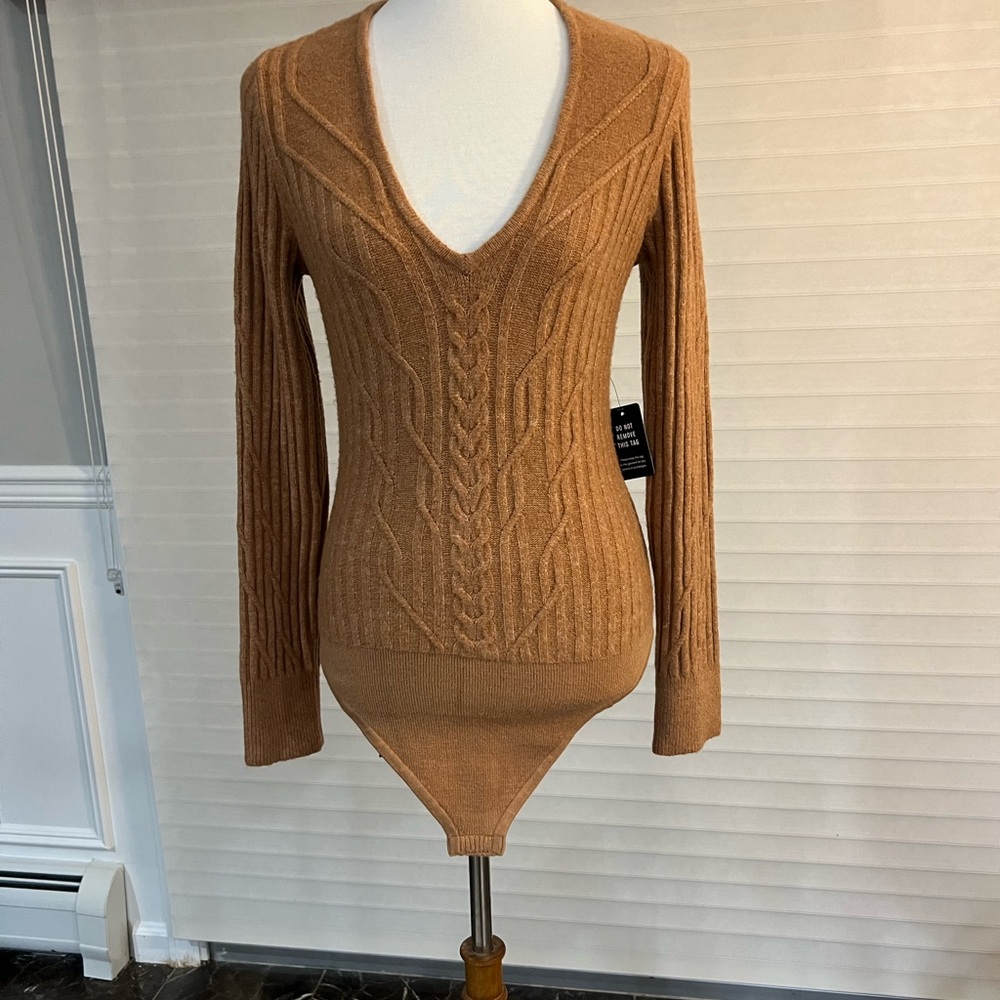 A cozy cable knit body suit